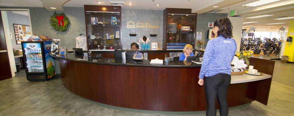 Women checking in at front desk