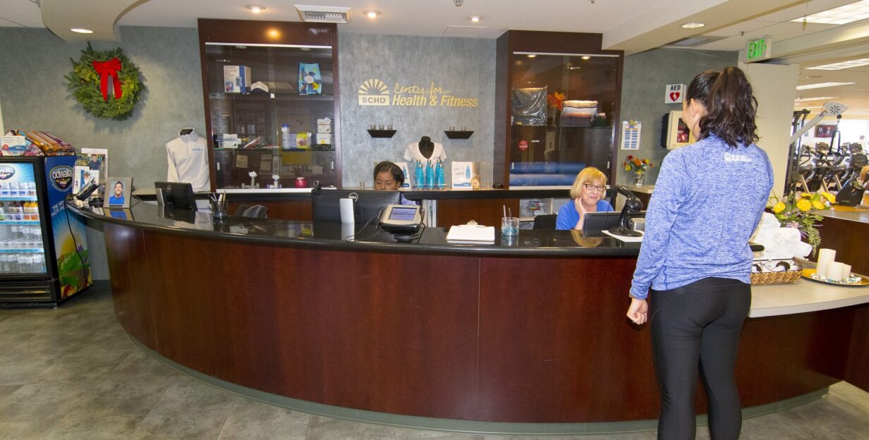 Women checking in at front desk