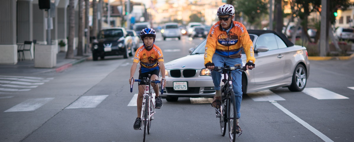 older adult on bike