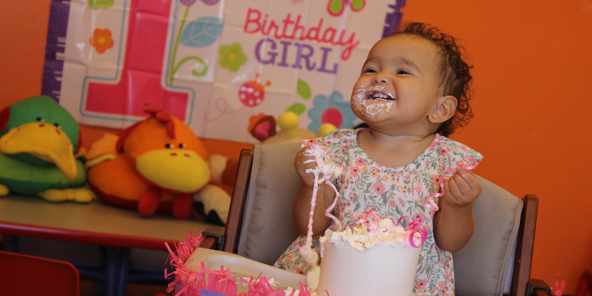 Girl eating birthday cake
