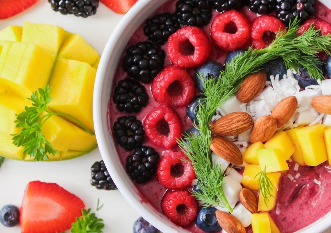 Bowl of colorful fruits.