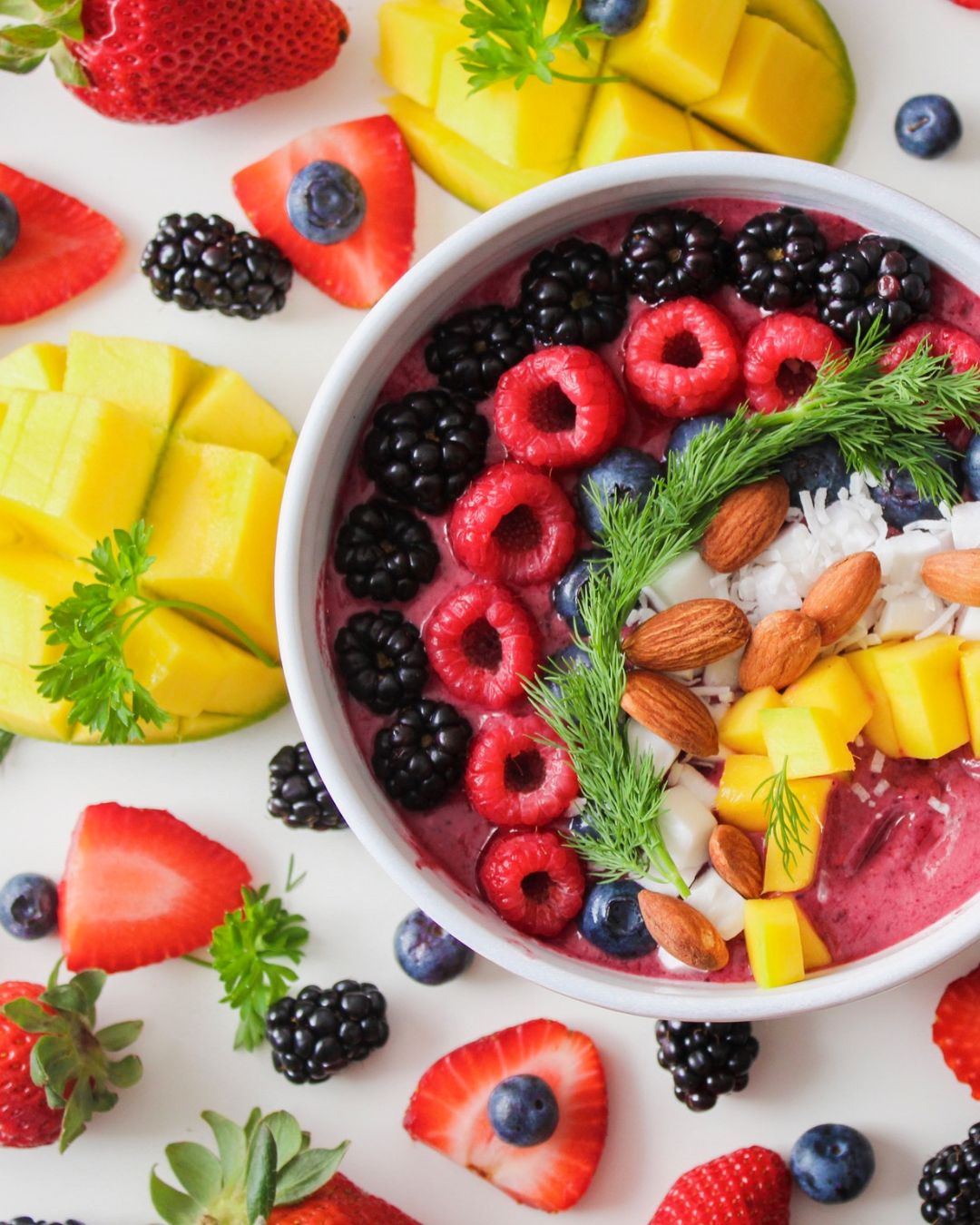 Bowl of colorful fruits.